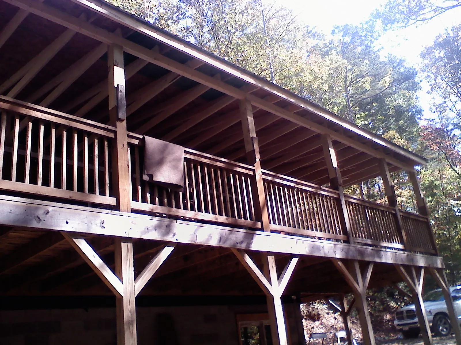 Timber framing under a new elevated porch and deck — Roof Leak Repair in Maple Hill by Roofing Brothers